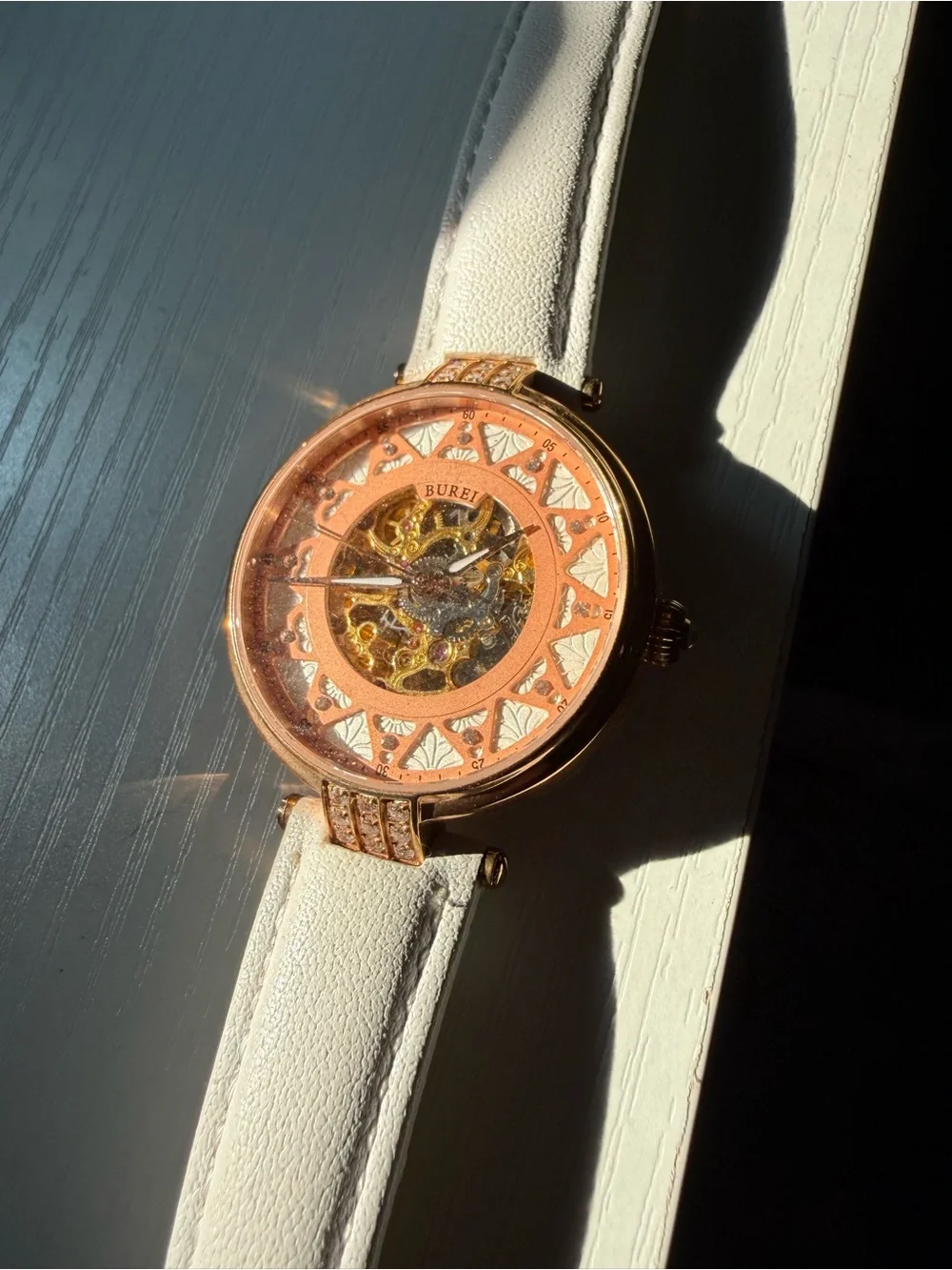 Bureau Rose Gold Skeleton Dial Watch with White leather Strap